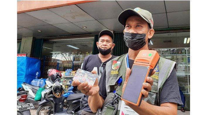 Mesin EDC pembayaran jasa parkir non tunai di Pekanbaru.